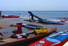 boca del río auxilia a 90 kayakistas a la deriva en la playa